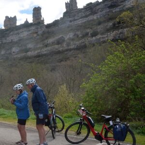 Cycling by the rock sentinels in La Rioja wine country Green Spain